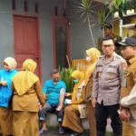 Polri Salurkan Bantuan dan Evakuasi Warga Terdampak Banjir di Bekasi dan Depok