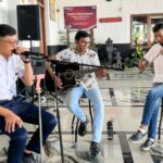Sentuhan Musik di Tengah Nataru, KAI Divre II Sumbar Manjakan Penumpang Kereta Api